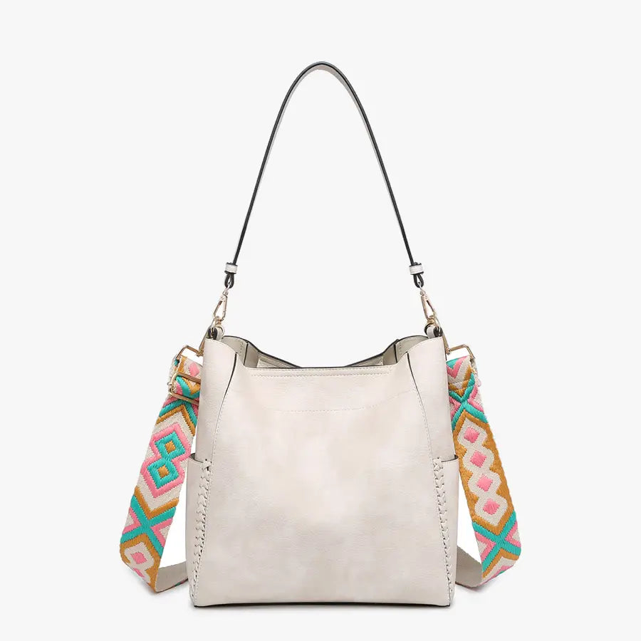 CROSSBODY PURSES AND GUITAR STRAPS
