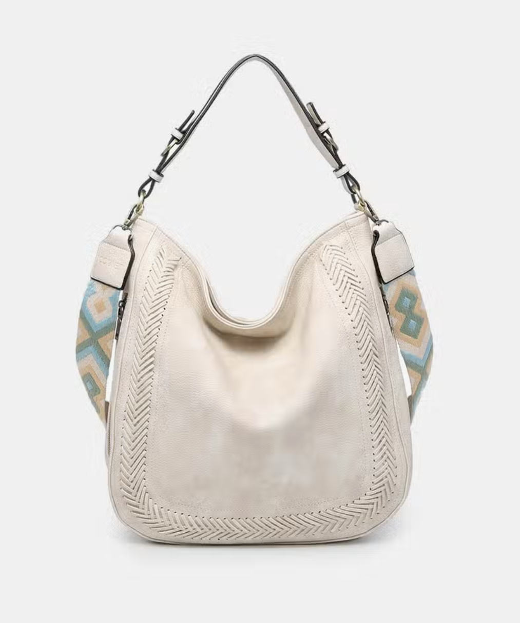 CROSSBODY PURSES AND GUITAR STRAPS