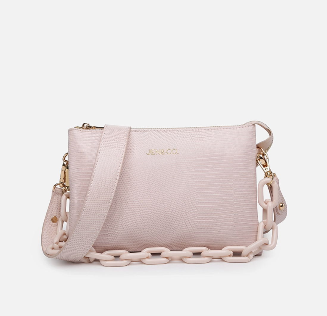 CROSSBODY PURSES AND GUITAR STRAPS