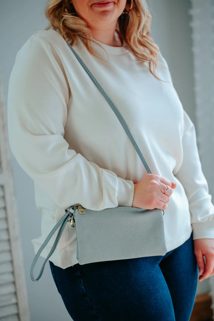 CROSSBODY PURSES AND GUITAR STRAPS
