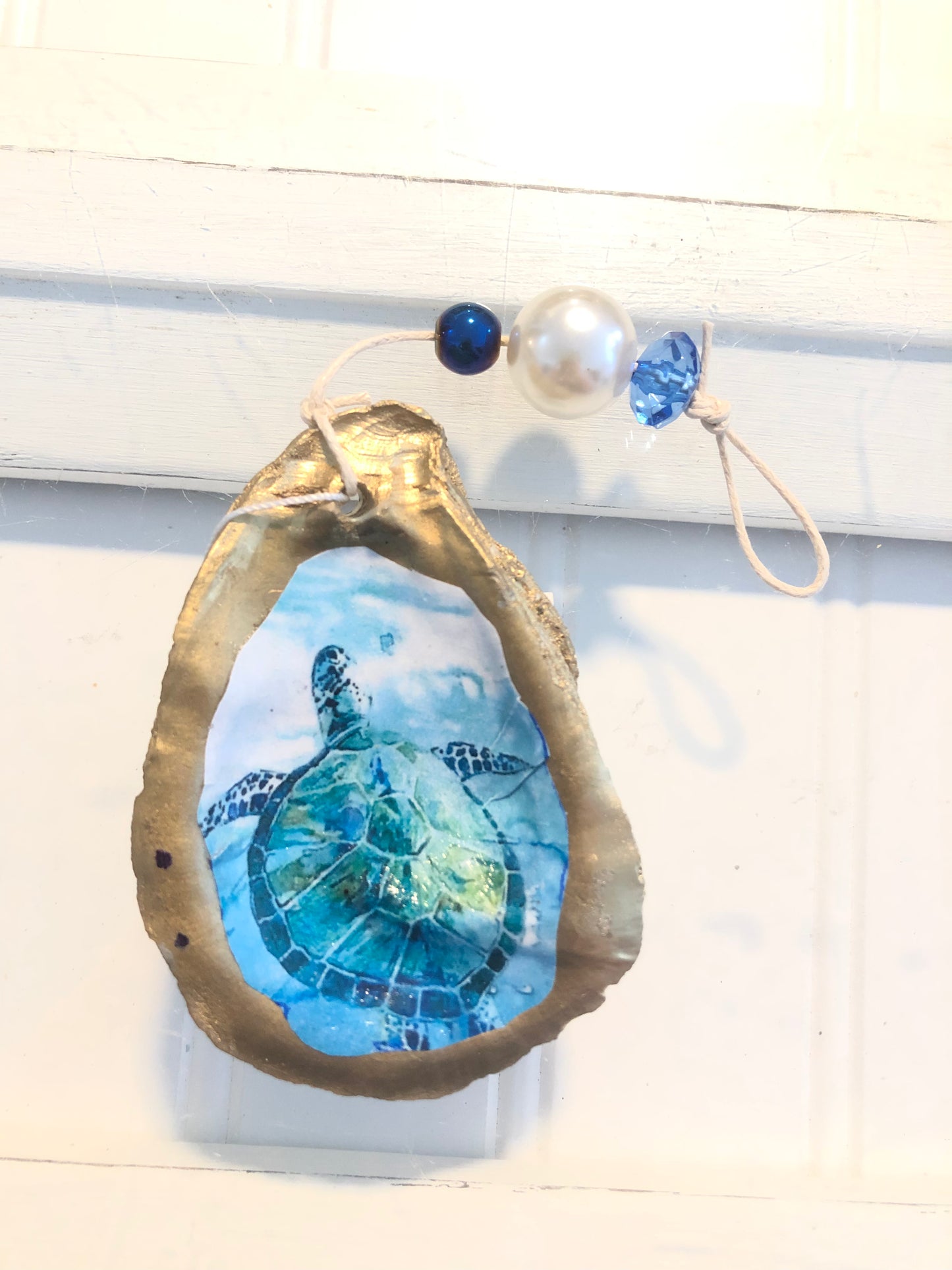 DECOUPAGE SHELL ORNAMENTS