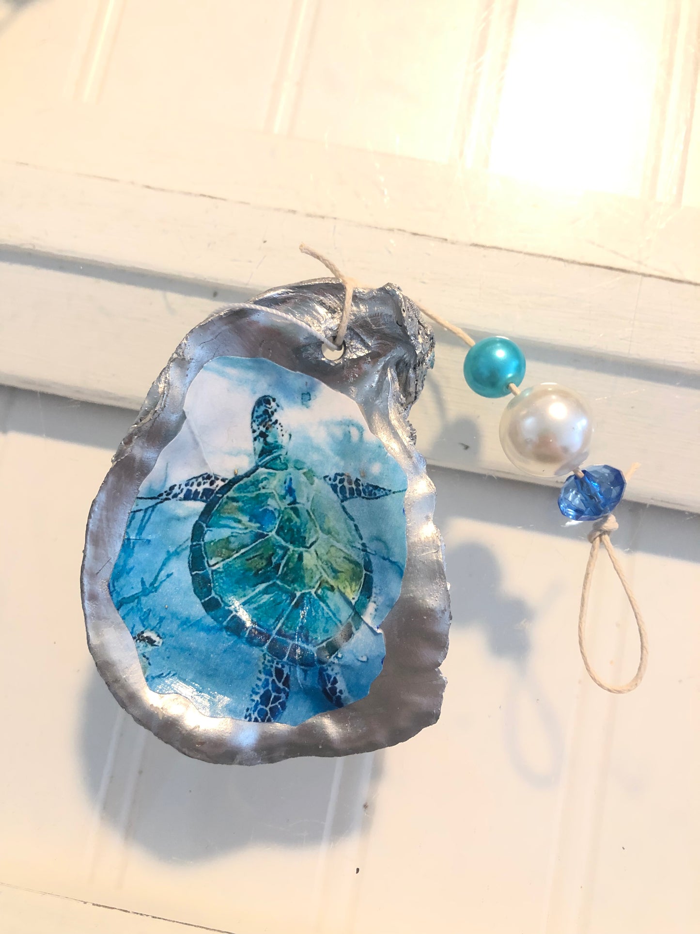 DECOUPAGE SHELL ORNAMENTS