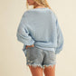 VARSITY V-NECK SWEATER TOP
