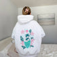 SURFING THE WAVES EMBROIDERED HOODIE