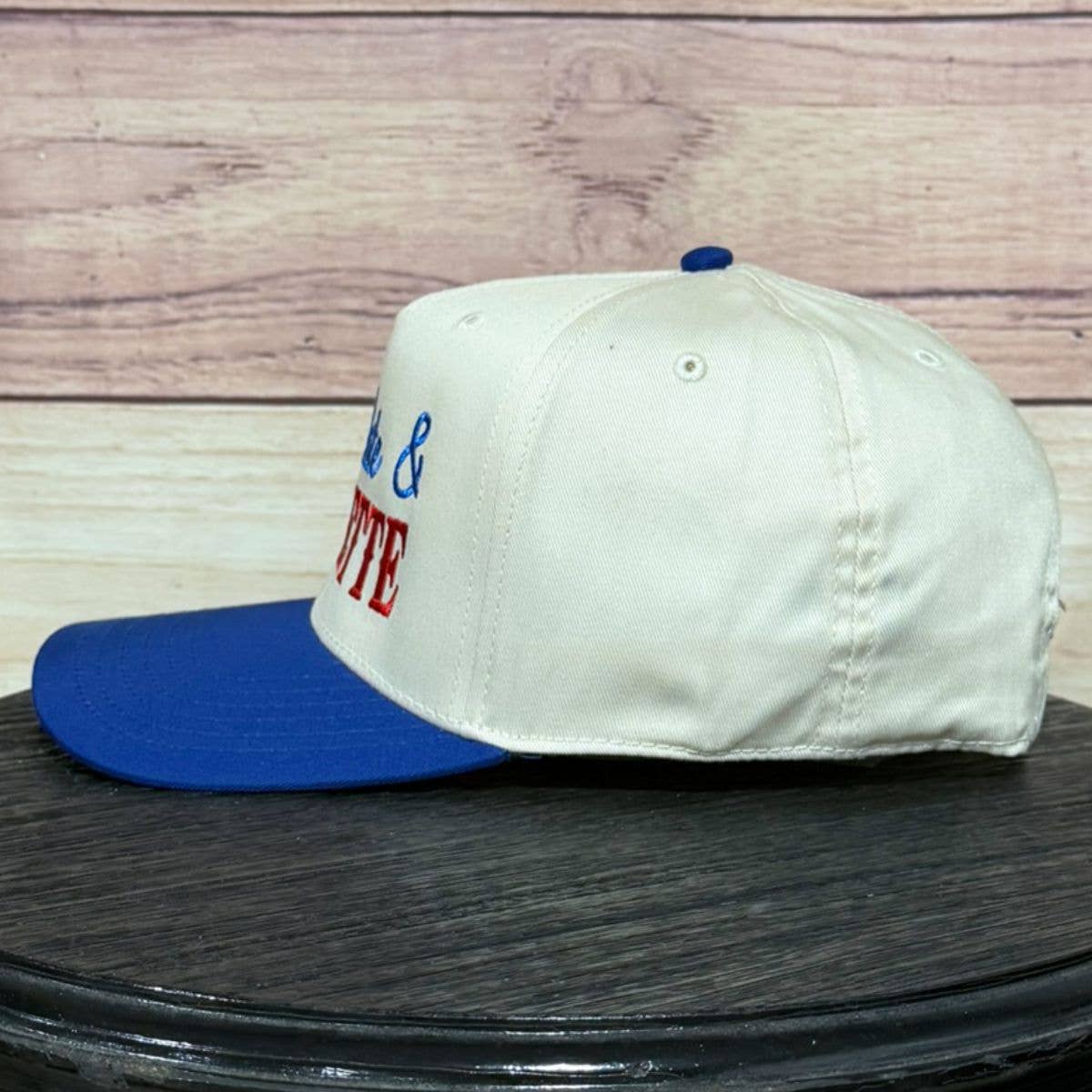 RED, WHITE, AND BRUNETTE EMBROIDERED HAT