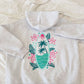 SURFING THE WAVES EMBROIDERED HOODIE