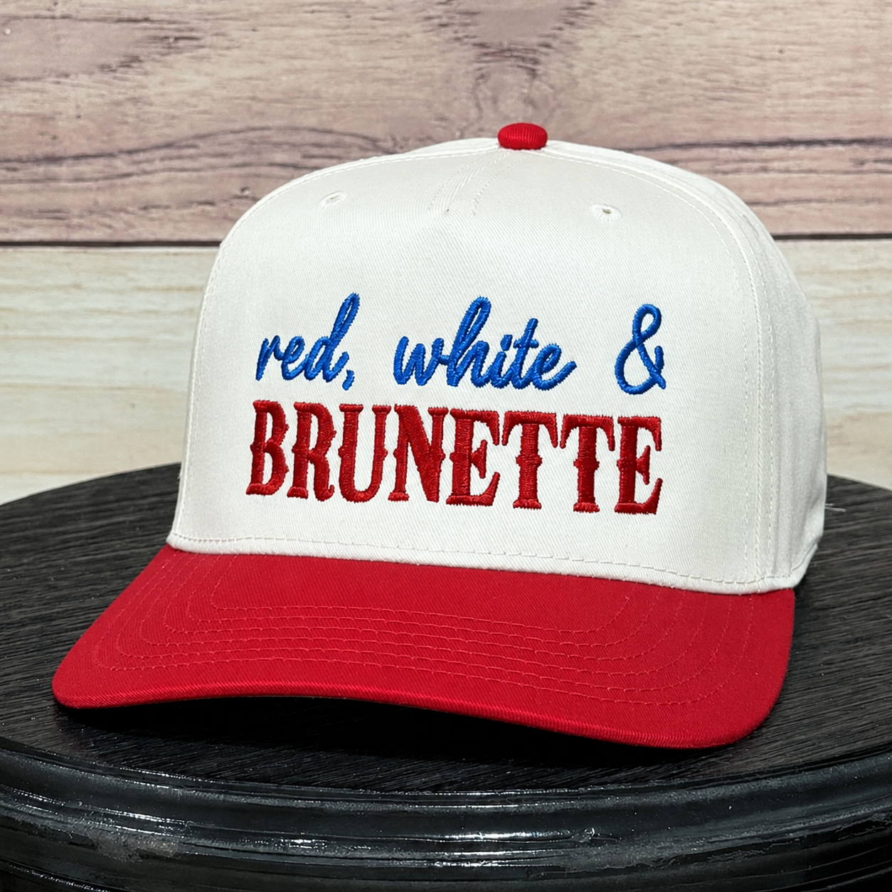 RED, WHITE, AND BRUNETTE EMBROIDERED HAT