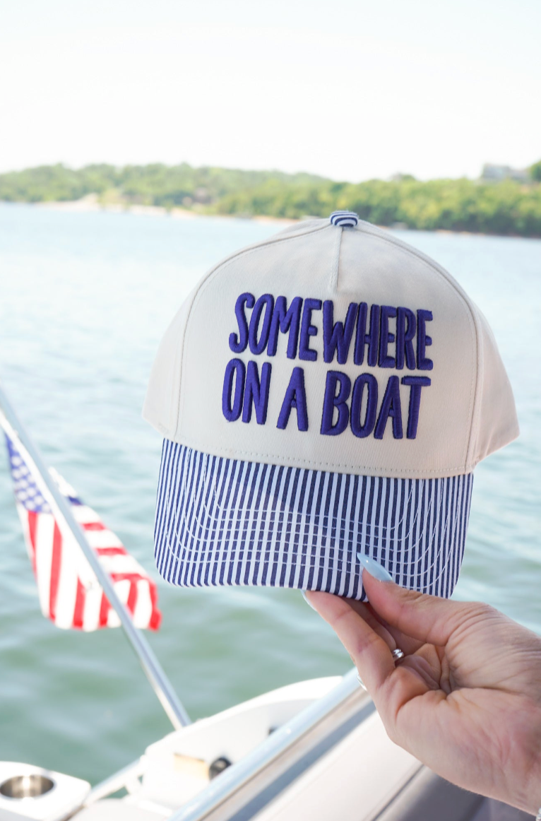 SOMEWHERE ON A BOAT