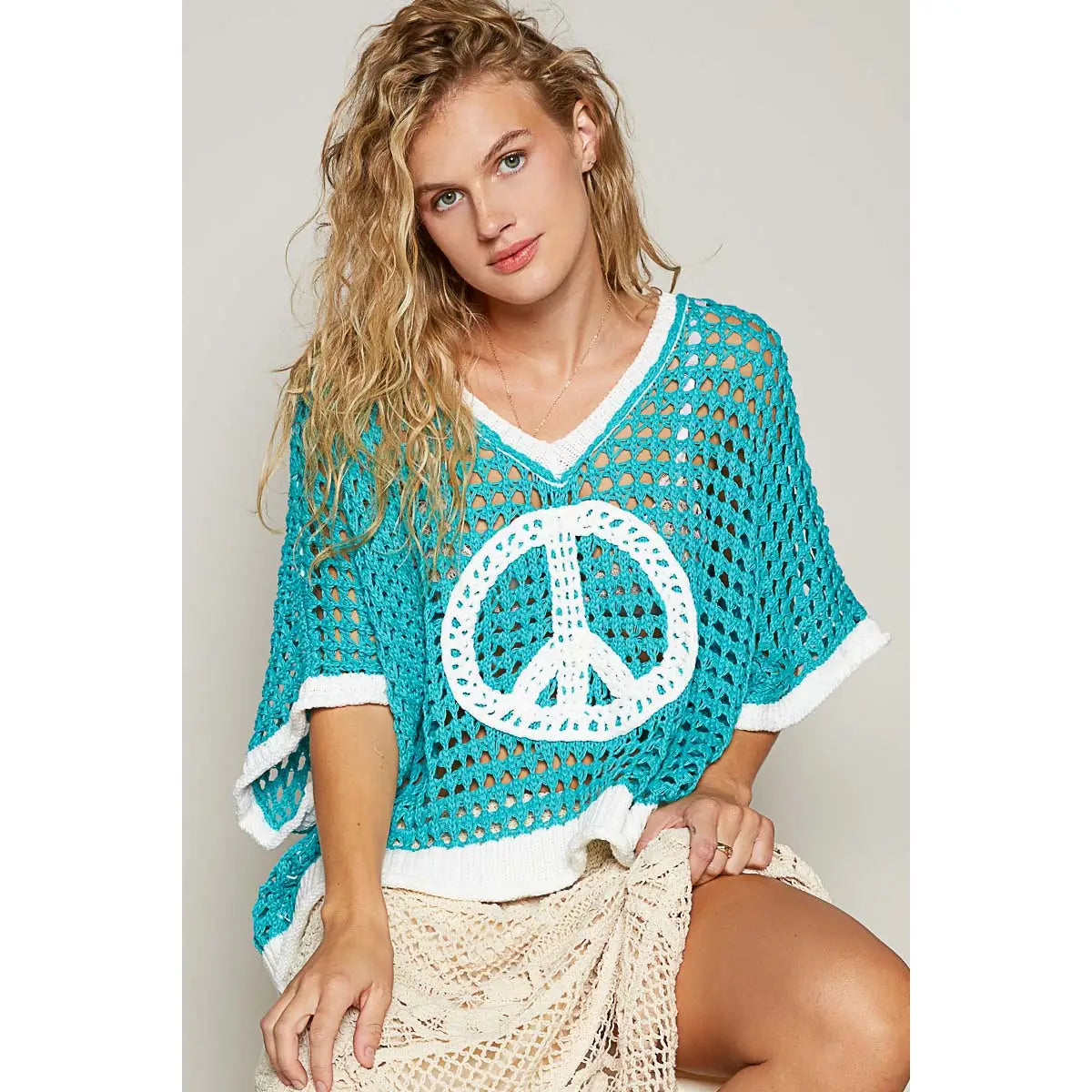 KNIT SHORT SLEEVE PEACE SIGN SWEATER